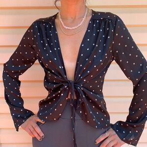 Fiction black white polkadot long sleeved blouse, front ties, wrist slits, S
